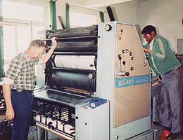 Mariannhill Brothers in South Africa work a printing press